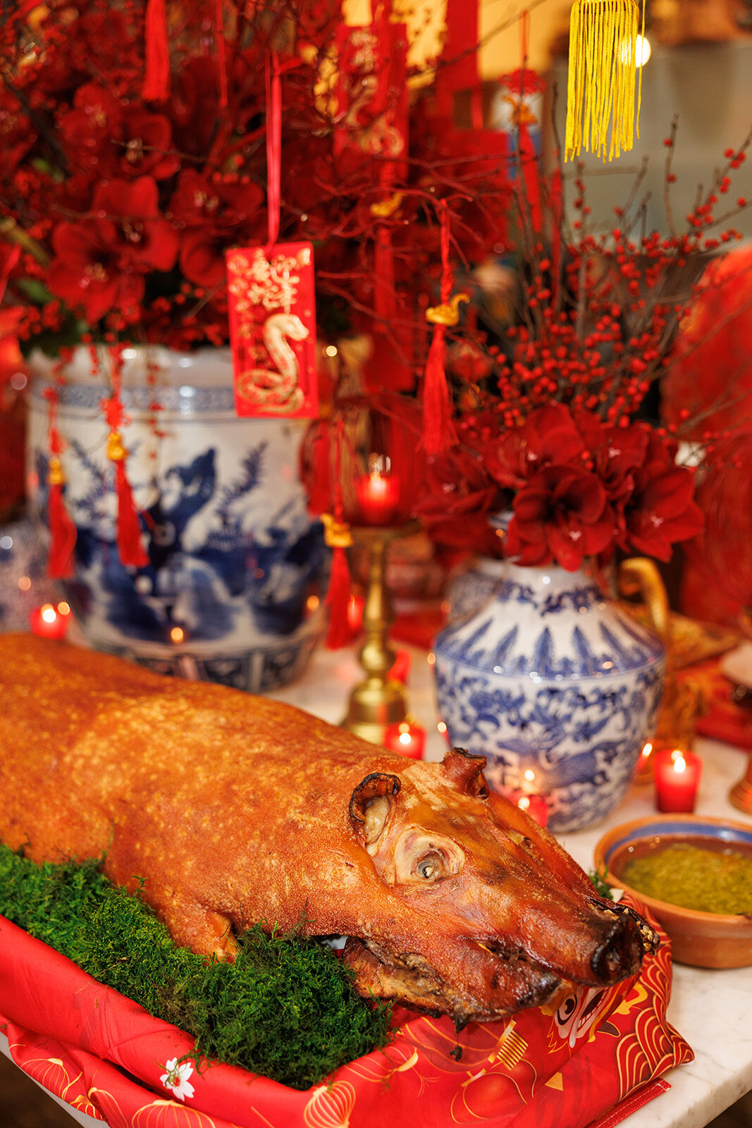 A Chinese New Year feast with vibrant decor. (Photo by Collin Pierson)